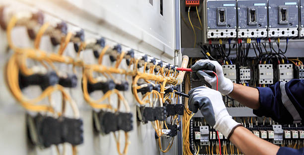 Professional Electrician technician working in Island Lake, IL